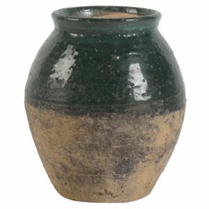 A rustic ceramic pot with a green glazed upper half and an unglazed lower half.